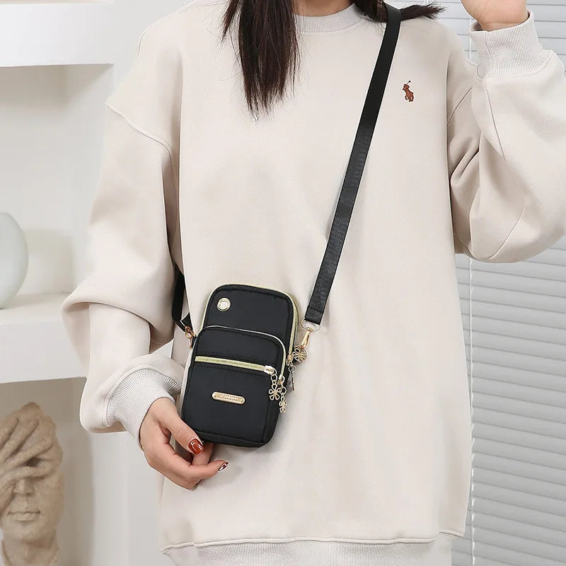 Crossette Kleine Zip-Umhängetasche