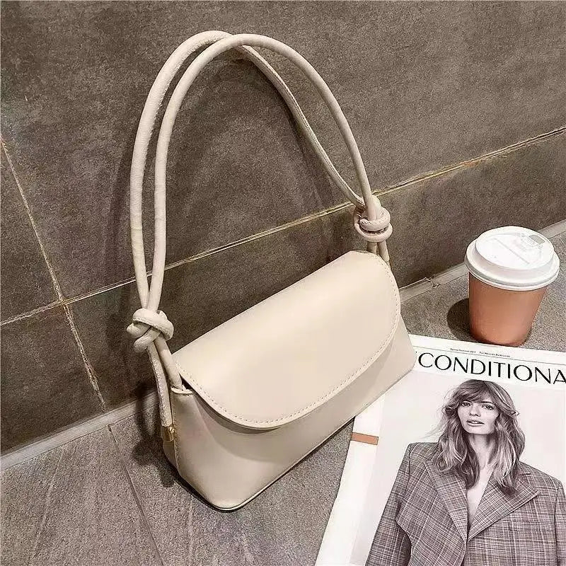 Pariselle Kompakte Quadratische Tasche mit Klapsverschluss