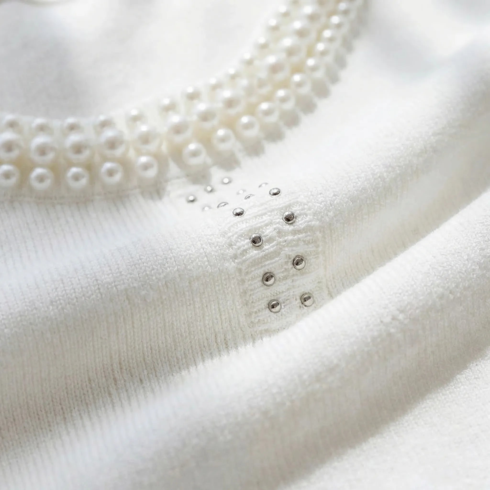 Pearlette Ärmellose Strickweste Mit Perlenbesatz