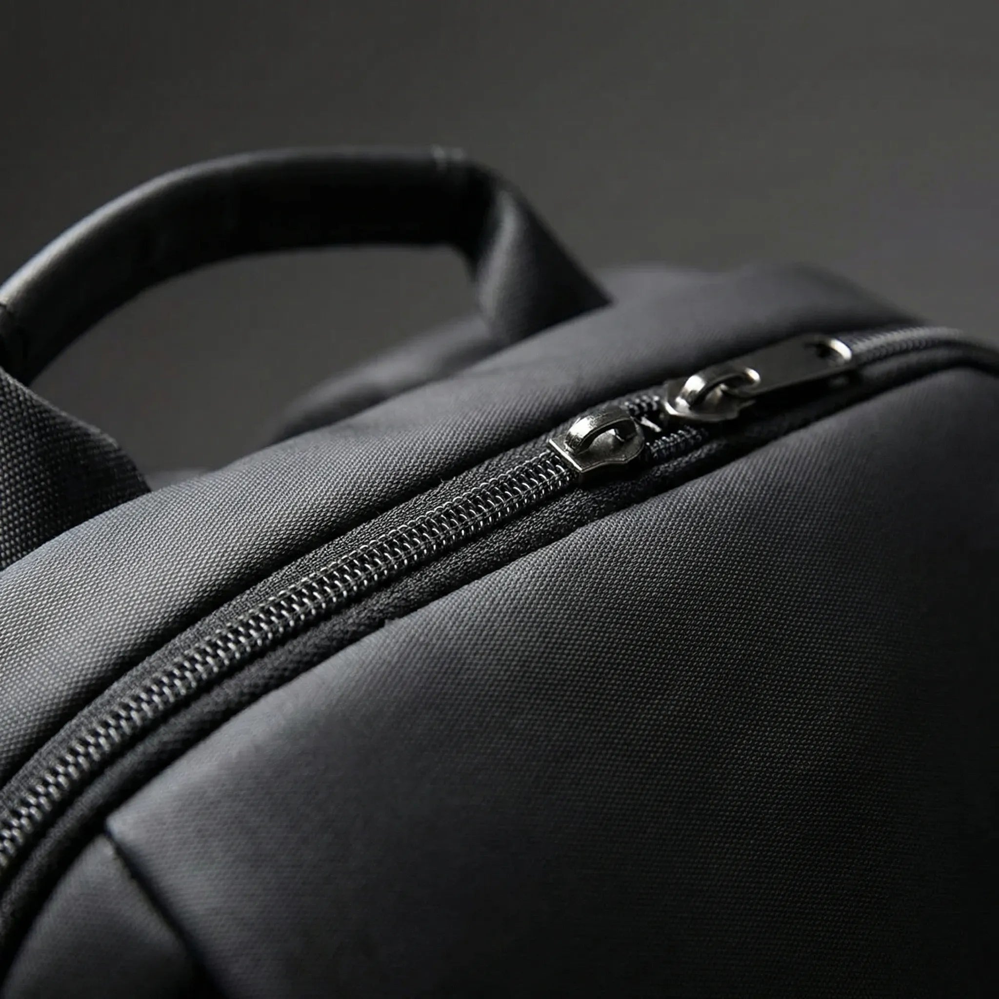 Slyvex Slim Wasserabweisender Laptop-Rucksack