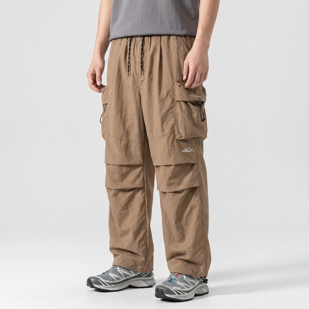 Herren Cargohose Baggy – weit geschnittene Parachute-Hose mit Reißverschlusstaschen